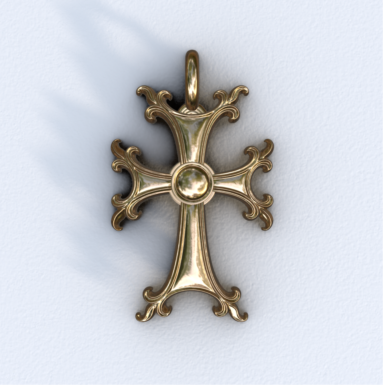 Gold cross pendant on a light gray background